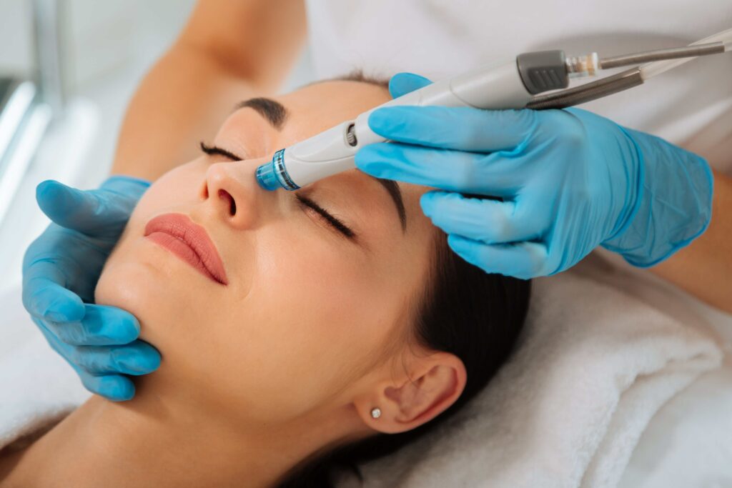 Women receiving a non-surgical facial procedure